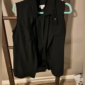 Me to a black sleeveless top size large